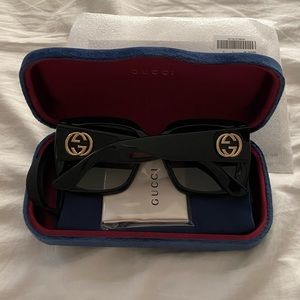 GUCCI sunglasses.